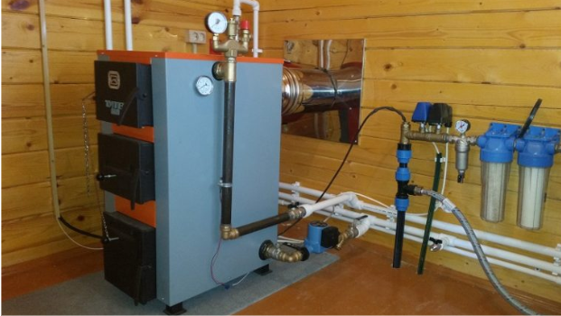 монтаж-твердонакопительного-котла-на-коттедже